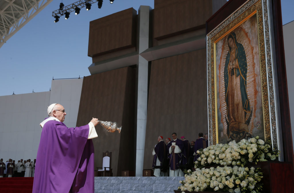 Pope Francis uses incense to venerate an image of Our Lady of Guadalupe during Mass in Ecatepec near Mexico City Feb. 14. (CNS photo/Paul Haring) See POPE-ECATEPEC Feb. 14, 2016.
